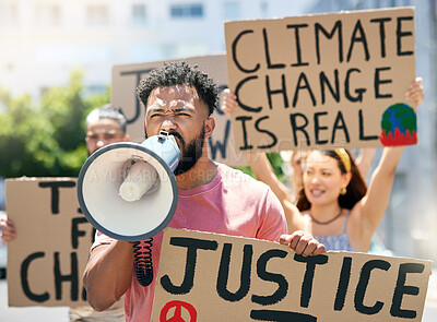 Buy stock photo Cropped shot of a group of young people protesting in the city