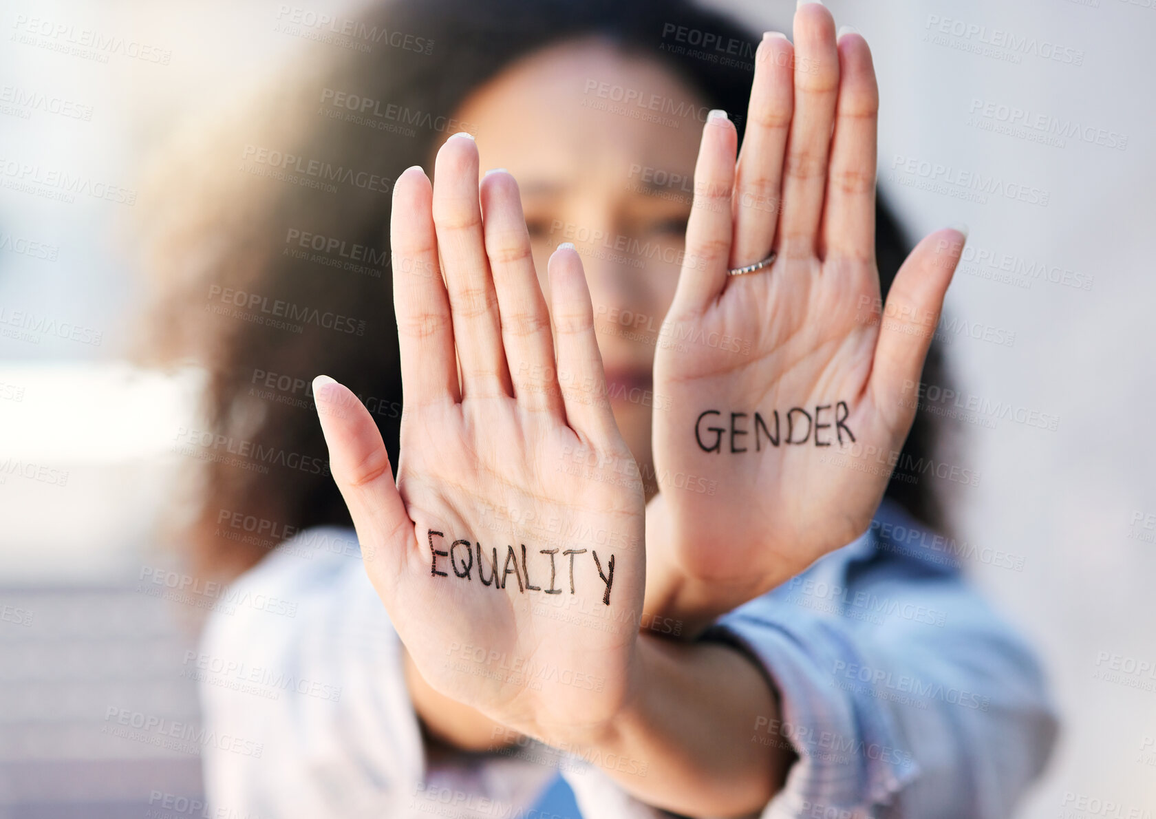 Buy stock photo Cropped portrait of an attractive young woman protesting in the city