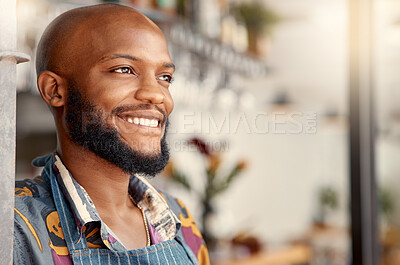 Buy stock photo Shot of a young business owner taking a break