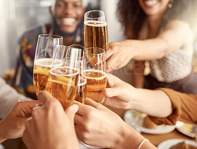 Buy stock photo Shot of a group of friends toasting in restaurant