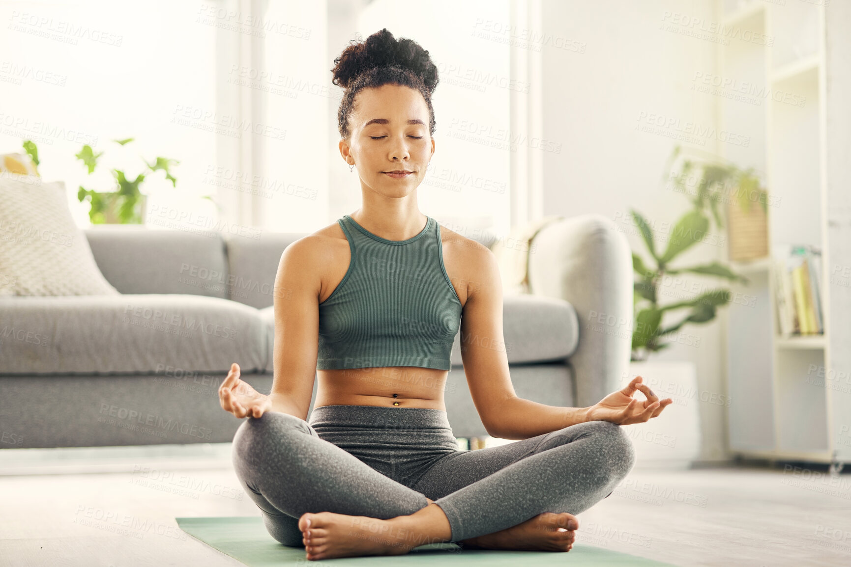 Buy stock photo Woman, meditation and lotus pose on living room floor for peace, mental health and wellness at home. Yoga, breathing and exercise by female meditating in a lounge for zen, holistic or chakra training