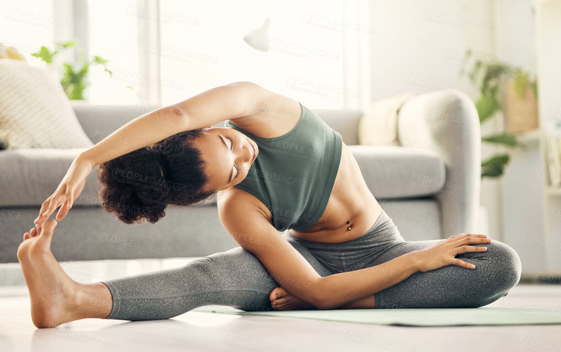 Buy stock photo Stretching, yoga and woman on a living room floor for training, exercise or mental health at home. Legs, stretch and lady with flexible fitness or pilates workout for balance, meditation or wellness