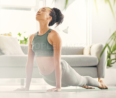 Buy stock photo Yoga, wellness and calm woman at home with zen, relax and back stretching for health in a living room. Young female person, apartment and lounge with pilates and flexibility exercise to meditate