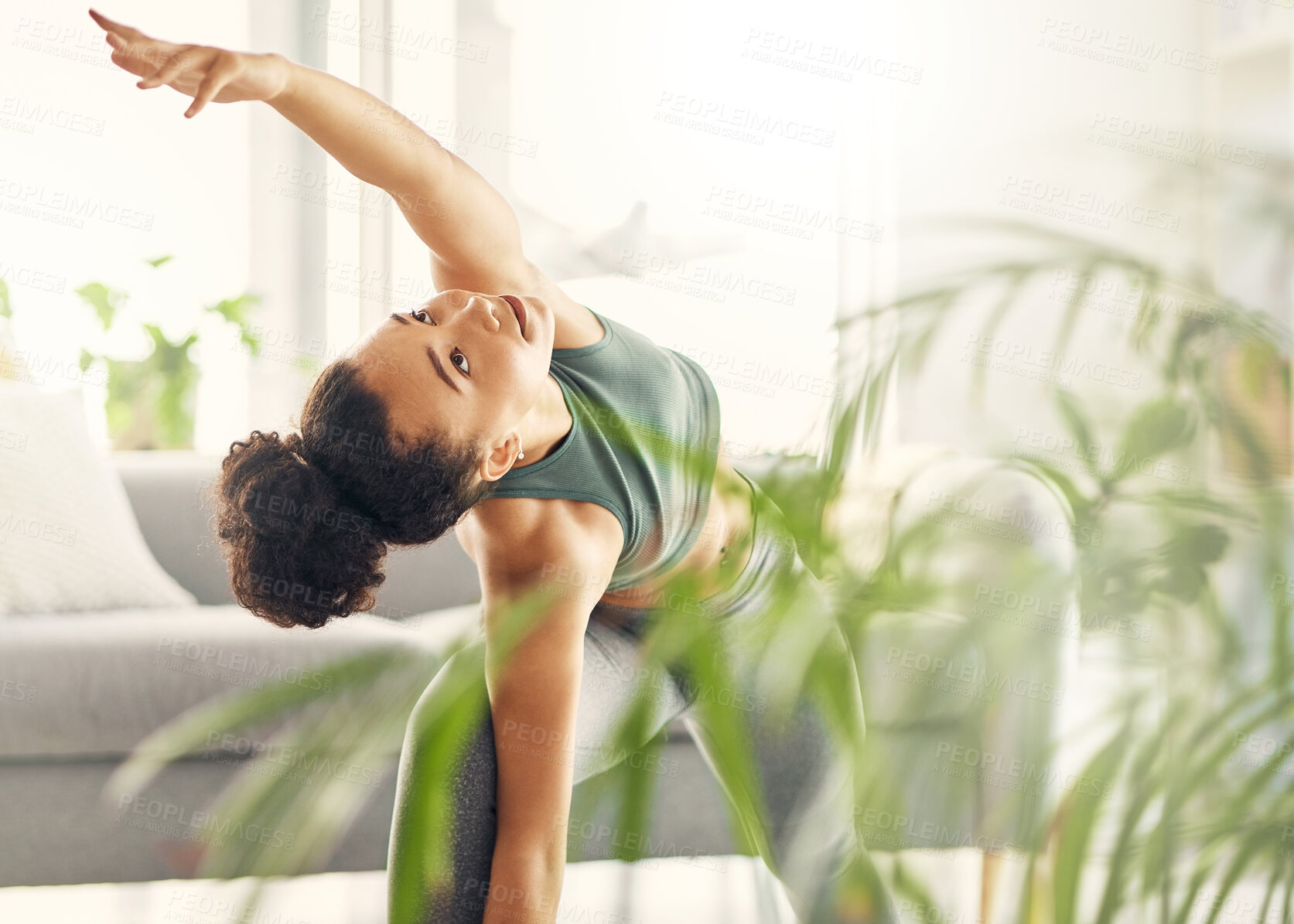 Buy stock photo Yoga, spiritual and woman at home with zen, relax and arm stretching for health in a living room. Young female person, apartment and lounge with pilates and flexibility exercise in house feeling calm