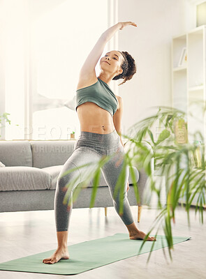 Buy stock photo Yoga, wellness and woman in home with zen, relax and spiritual practice in a living room. Young female person, apartment and lounge with pilates and flexibility exercise in house feeling calm