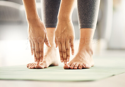 Buy stock photo Fitness, yoga and closeup of a woman stretching before a workout for health, wellness and flexibility. Calm, breathing and zoom of female person touching her toes before pilates exercise in her home.