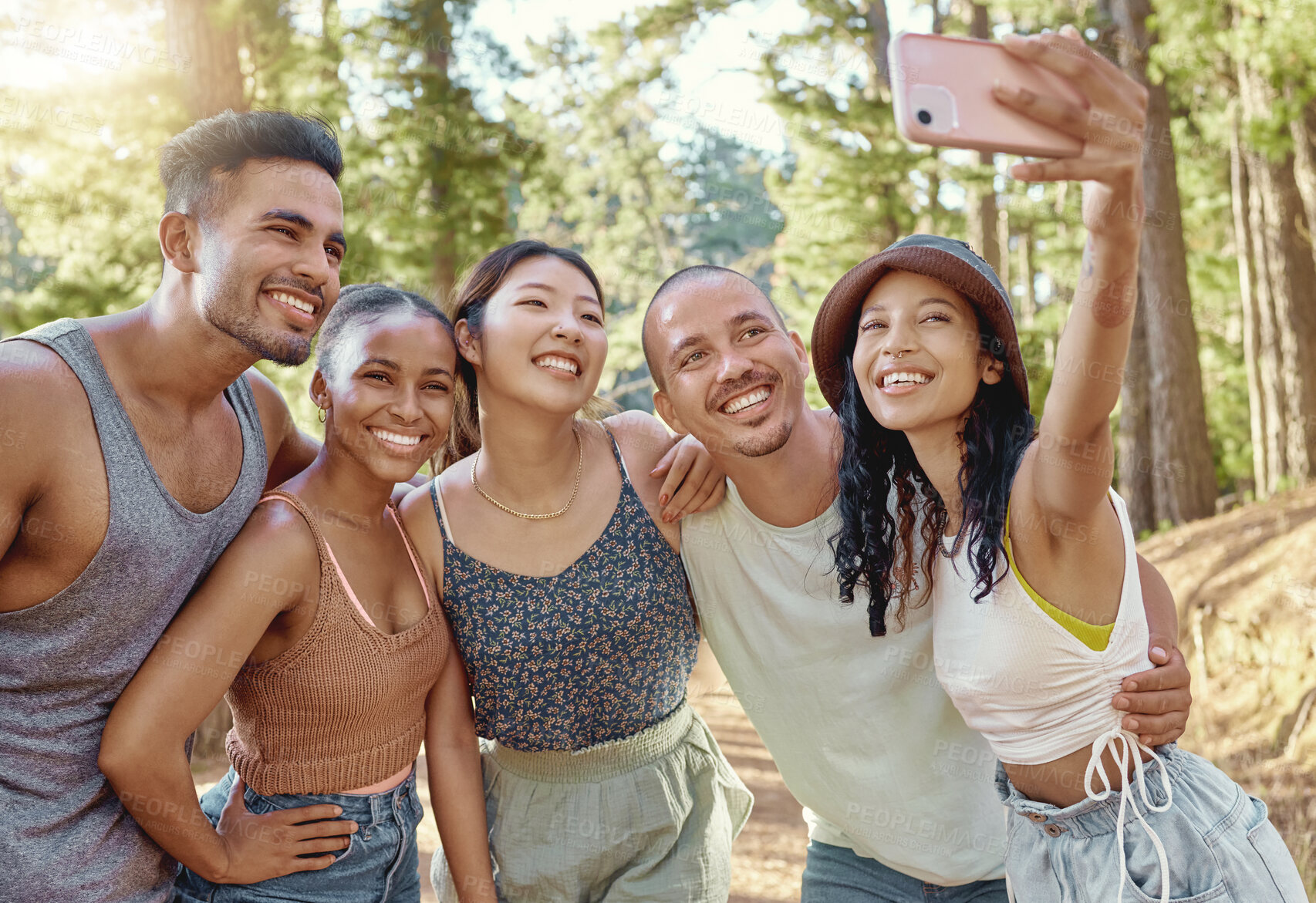 Buy stock photo Friends in forest, camping and selfie, travel with diversity and bonding, group of people in nature and vacation. Summer, fun and happiness, men and women smile in picture, memory and relax outdoor