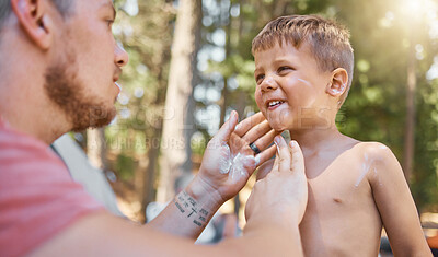 Buy stock photo Father apply sunscreen on child face for protection or safety while camping in a forest or woods for vacation or holiday. Lotion, cream and dad care for kid with skincare product in outdoor adventure