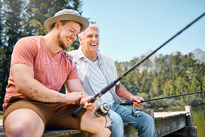 Buy stock photo Happy man, father and fishing in lake for fun bonding, hobby or relaxing together in the nature outdoors. Elderly male person laughing with son and enjoying time to catch fish on holiday by forest