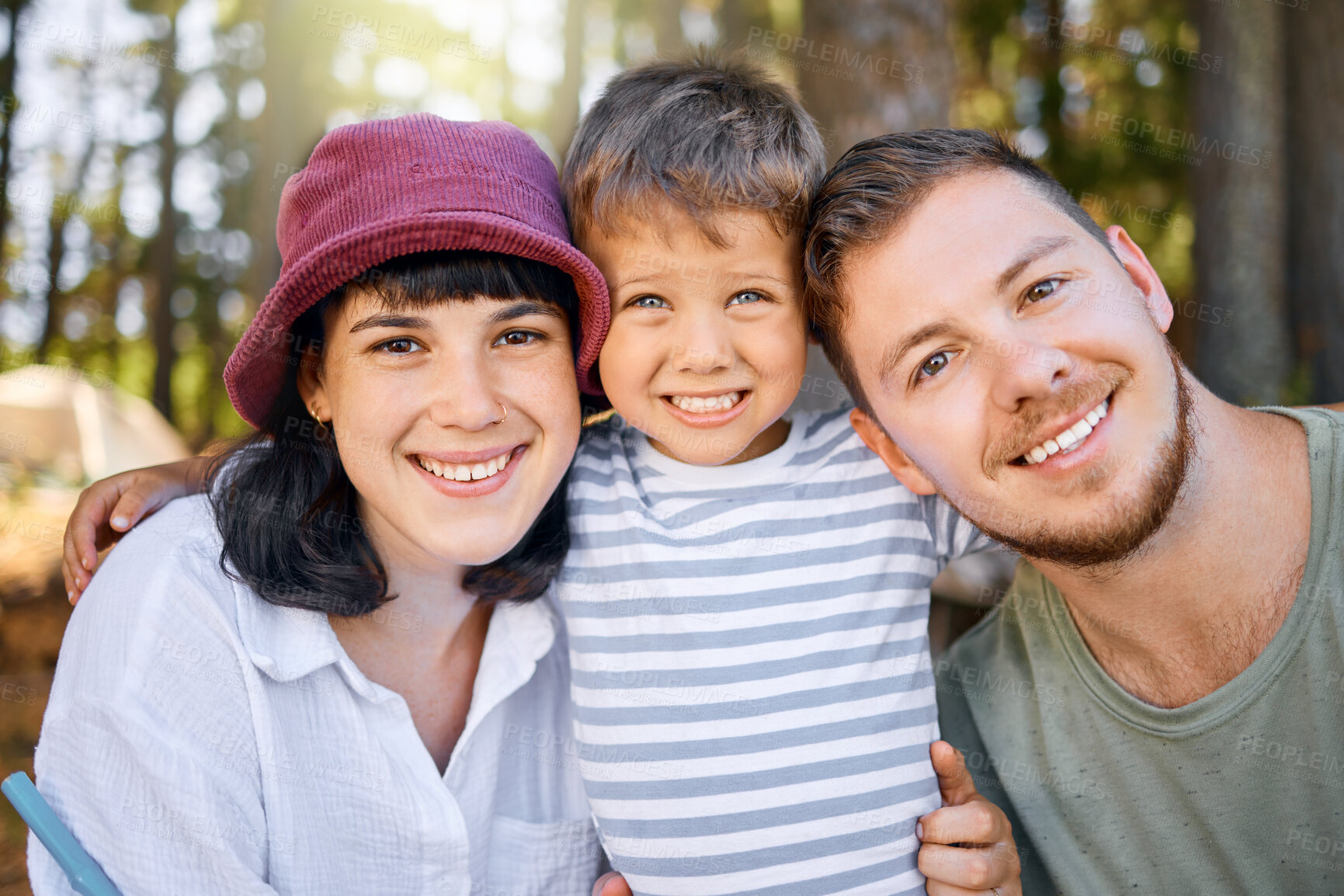 Buy stock photo Happy family, portrait and face in forest for camping vacation, holiday or weekend together in nature. Mother, father and child with smile in the woods for summer getaway, trip or adventure outdoors