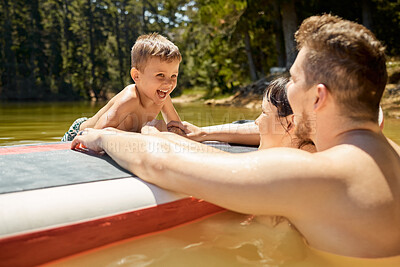 Buy stock photo Happy, family with boat and in lake together with smile for bonding time. Summer vacation or holiday break, happiness or freedom and people in a river with outdoor activity for adventure or wellness