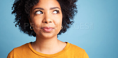 Buy stock photo Thinking, solution and woman with a decision, ideas and girl against a blue studio background. Female person, African or model with problem solving, choice and fantasy with future, thoughts or wonder