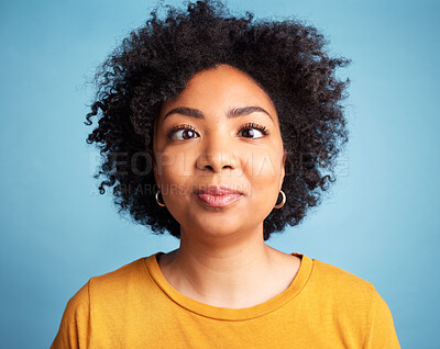 Buy stock photo Funny, comic and a portrait of a woman on a blue background for emoji facial and crazy expression. Happy, comedy and face of a girl expressing goofy personality isolated on a studio backdrop