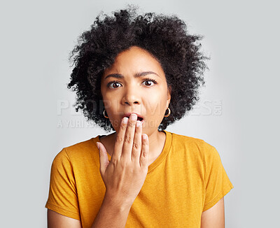 Buy stock photo Surprise, wow and woman covering mouth with hand isolated on a white background in studio. Shocked, face and African female person amazed, omg or surprised reaction to news, emoji or fear portrait