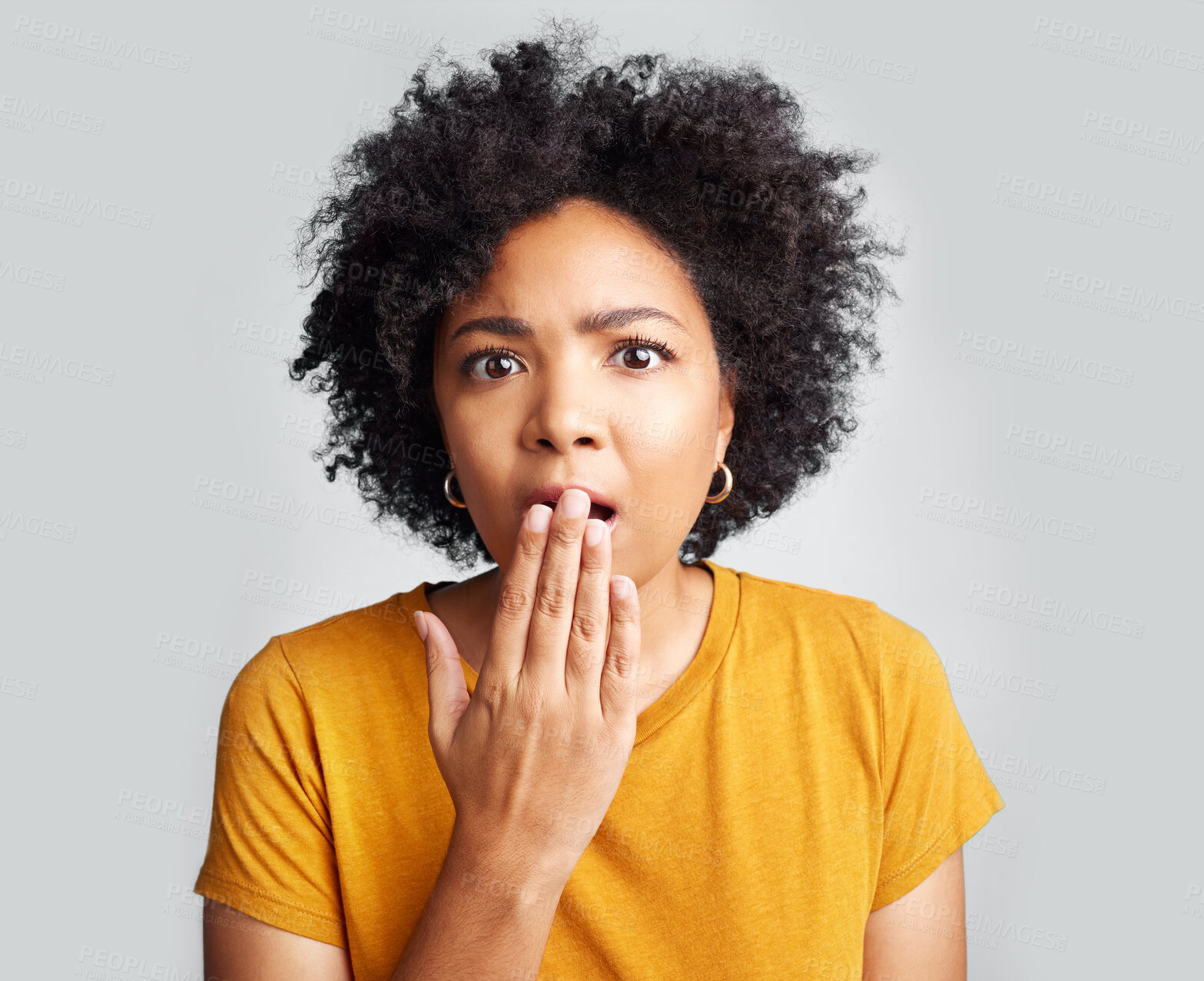 Buy stock photo Surprise, wow and woman covering mouth with hand isolated on a white background in studio. Shocked, face and African female person amazed, omg or surprised reaction to news, emoji or fear portrait