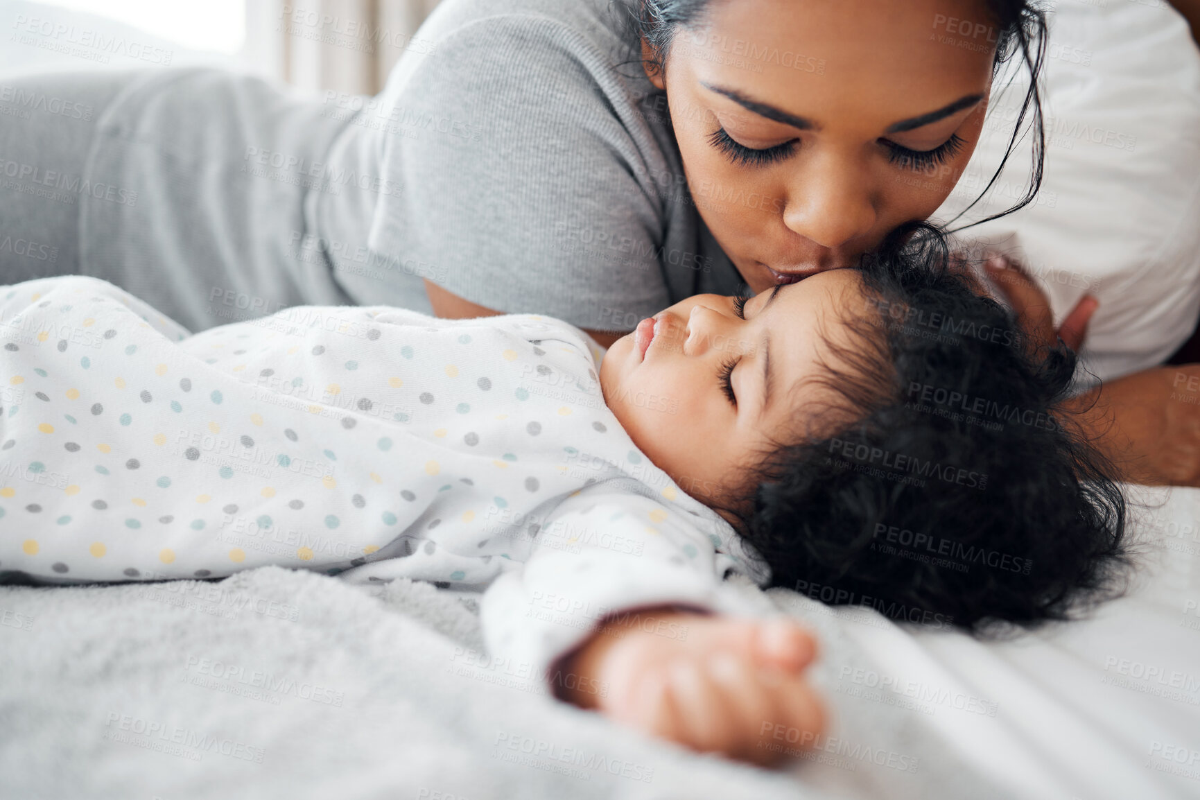 Buy stock photo Sleeping baby, mother and kiss on bed for love, bonding and protection in home. Woman, infant child and resting in bedroom with affection, relationship development and security with family growth