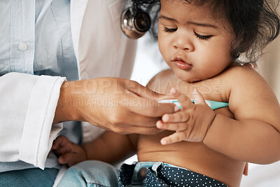 Buy stock photo Checkup, baby and hands of doctor with thermometer, assessment and inspection for fever in clinic. Medical, child and pediatrician with tool for axillary temperature, monitor diagnosis and wellness