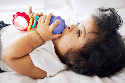 Buy stock photo Shot of a little baby girl playing with her toys