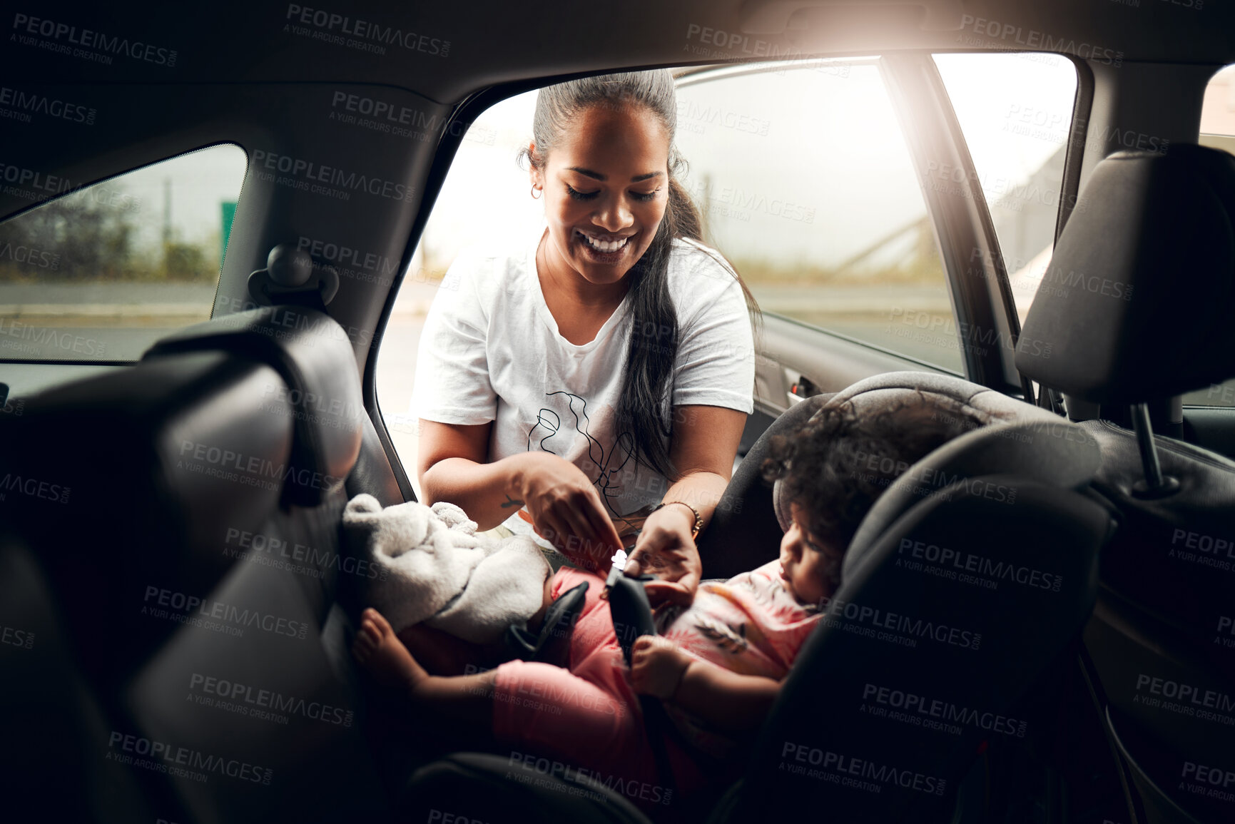 Buy stock photo Happy mother, car and baby with seat for travel, road trip vehicle safety or security in city. Mom, child or kid with harness, belt or protection for transportation, journey or adventure together