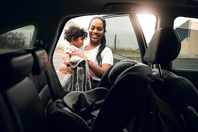 Buy stock photo Happy mother, car and baby with seat for road trip, travel and vehicle safety in city. Mom, child or kid with harness, belt or protection in security for transportation, journey or adventure together