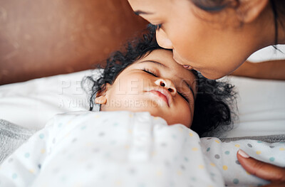 Buy stock photo Sleeping baby, woman and kiss on bed for love, bonding and protection in home. Mother, infant child and resting in bedroom with affection, relationship development and security with family growth