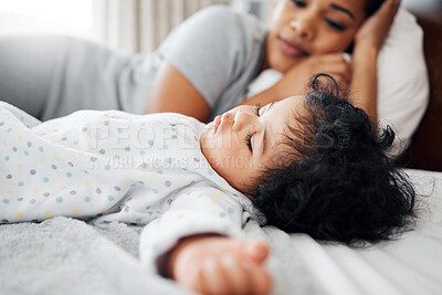 Buy stock photo Mom, baby and sleeping with bed for nap time, rest or peaceful morning together at home. Happy mother, young child or tired kid asleep for growth, bonding or love and support in bedroom at house