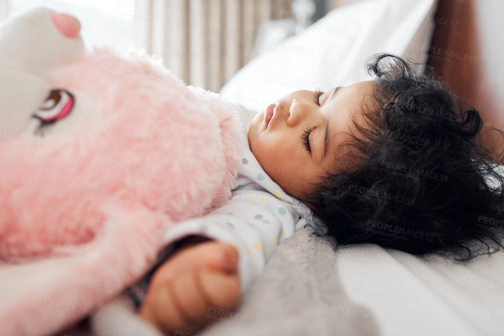 Buy stock photo Tired, baby and teddy bear in nursery for sleeping, dreaming and comfortable with rest for development. Home, bed and girl with fluffy toy for cuddle, peaceful nap and relax for child growth in house