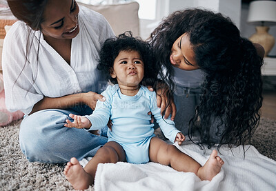 Buy stock photo Mom, baby and female siblings for bonding, development and playing together with moody or grumpy. Mother, toddler and sad little girl in home for support, growth and happy family with care or love