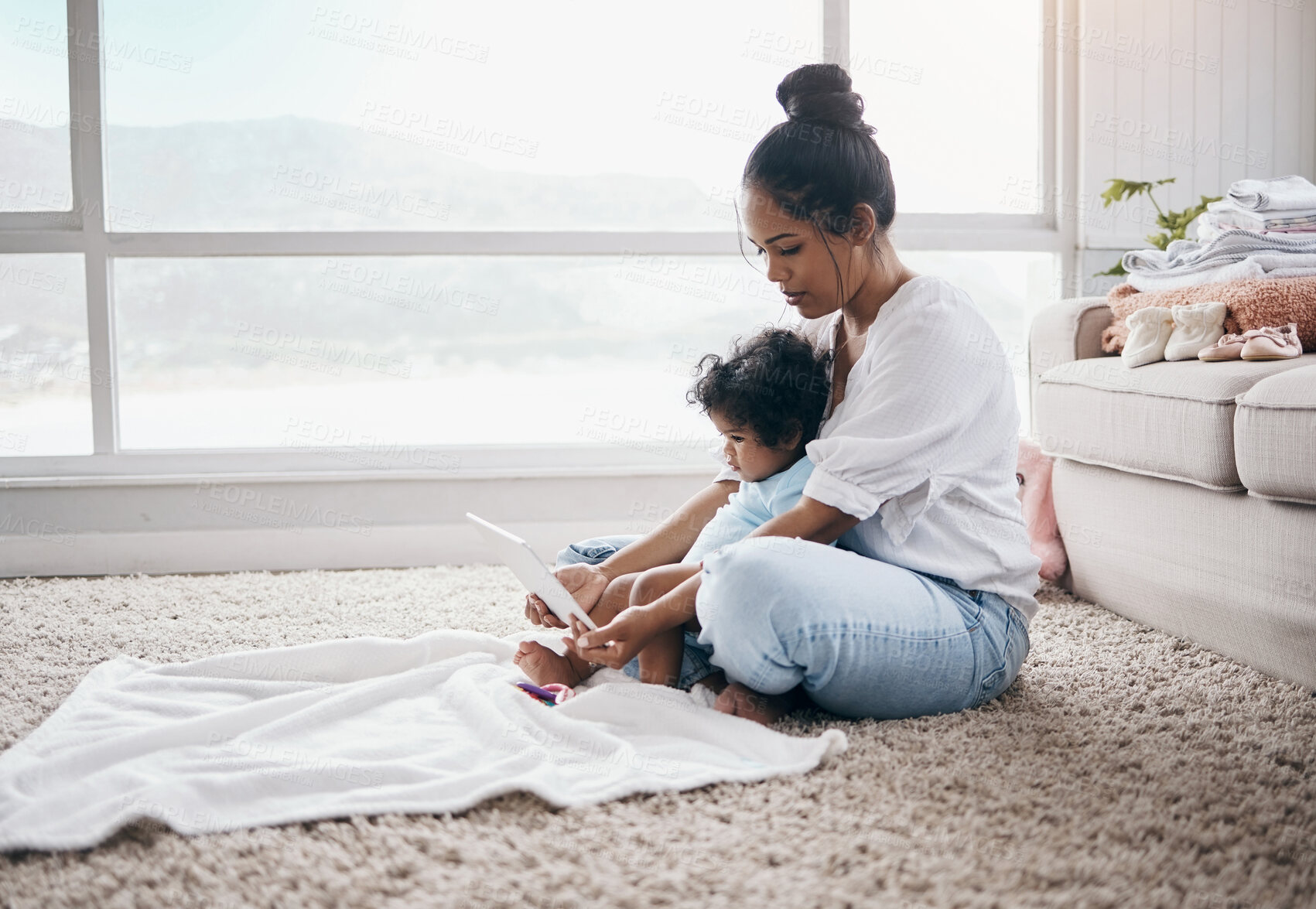 Buy stock photo Mother, baby and tablet for bonding, development and playing together with games, app and streaming. Mom, toddler and little girl in home for support, growth and happy family with care, relax or love