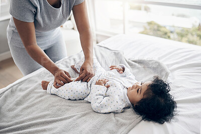 Buy stock photo Mother, care and dressing baby in home, love and parent tasks or responsibility for clean child. Mama, daughter and bonding with infant in bedroom, changing toddler and support kid with hygiene