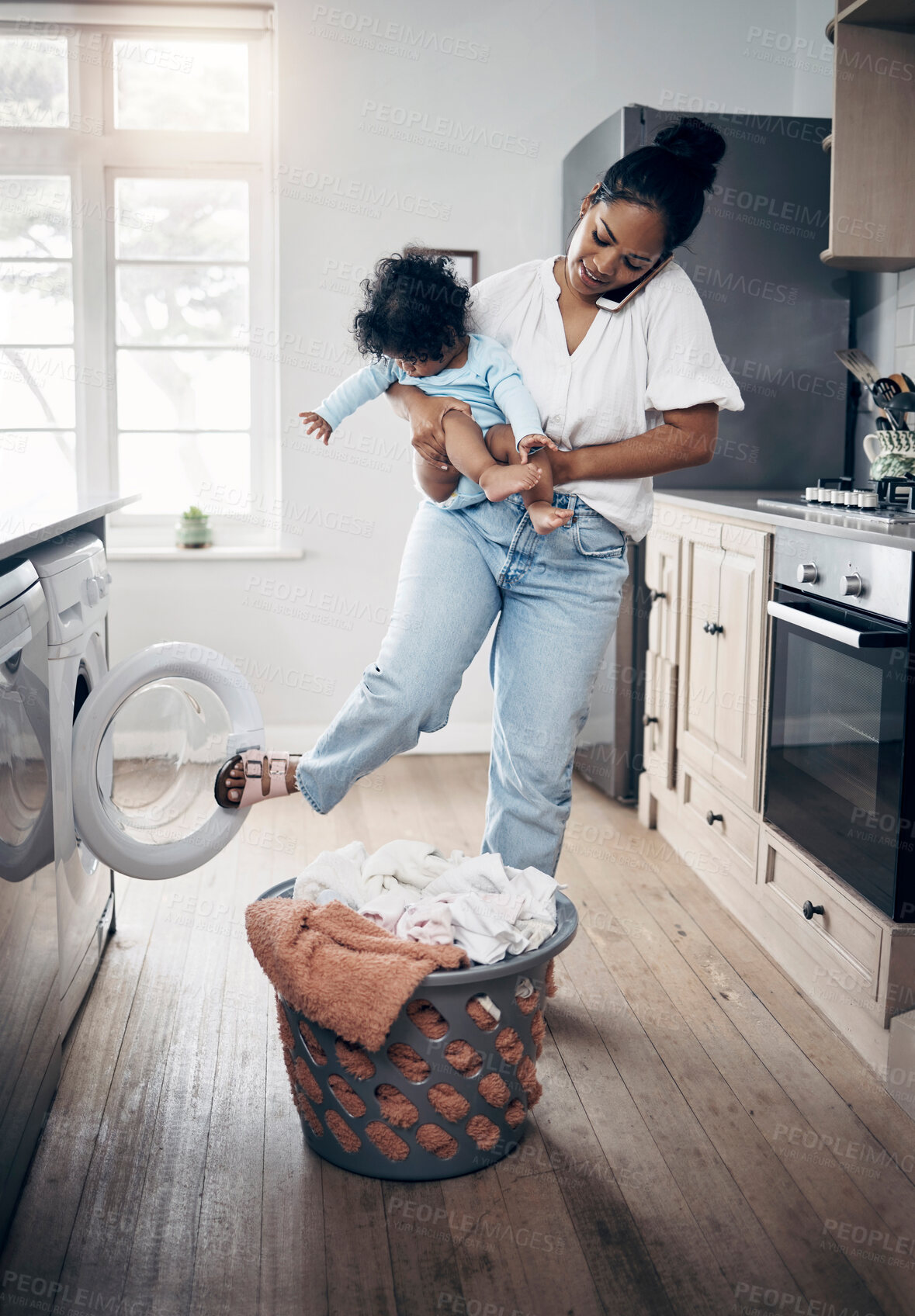 Buy stock photo Woman, child and phone call with laundry in home, household tasks and remote communication for work. Family, mother and care for kid with online conversation, love and multitasking with washing