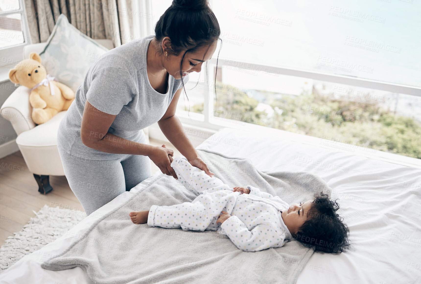 Buy stock photo Mother, trust and dressing baby in home, love and parent tasks or responsibility for clean child. Mama, daughter and bonding with infant in bedroom, changing toddler and support kid with hygiene