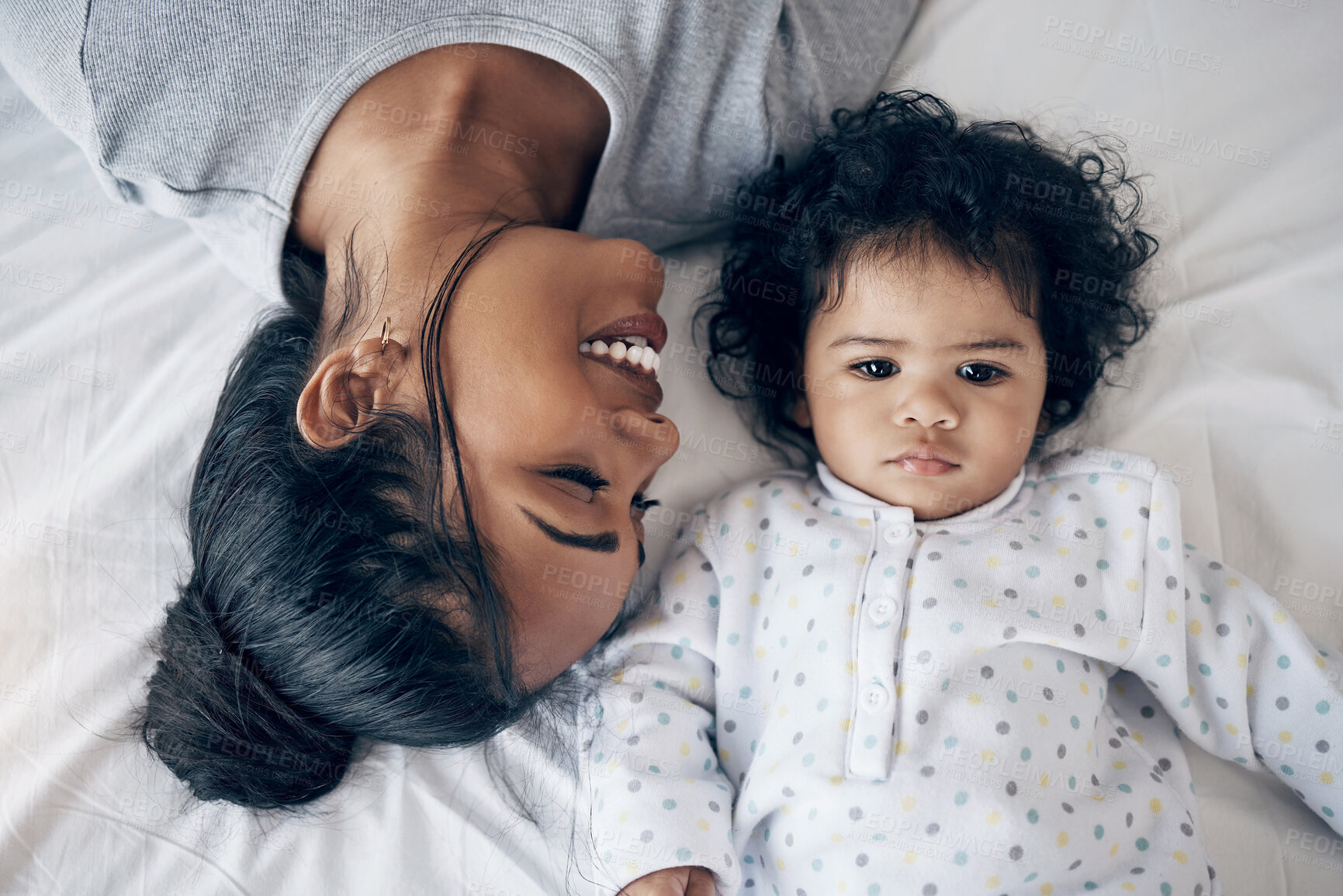 Buy stock photo Bonding, mother and happy with baby in home for affection, child development and morning routine on bed. Top view, woman and infant in bedroom for parenting, protection and relationship with wellness