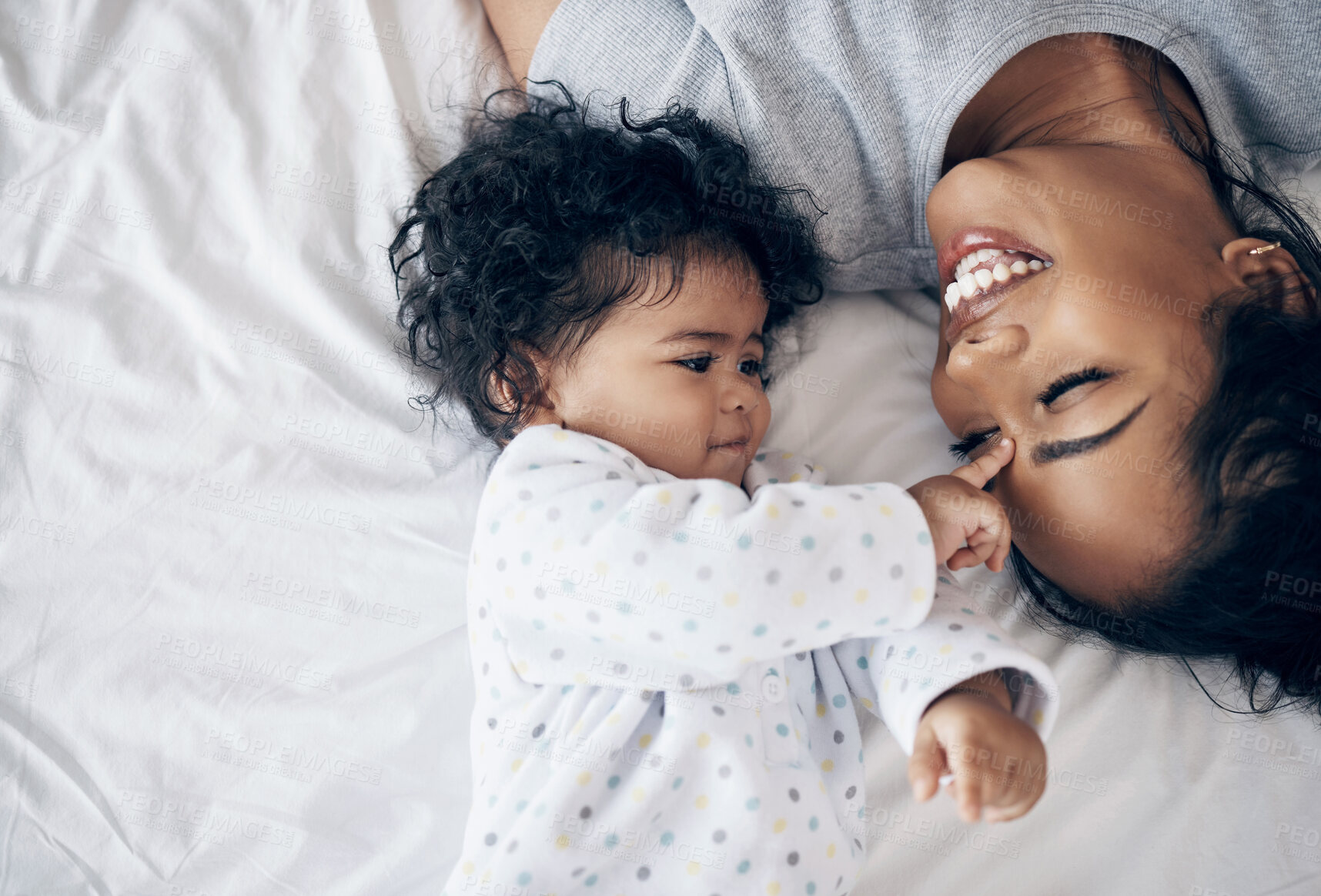 Buy stock photo Funny, mother and playing with baby on bed for affection, child development and morning routine in home. Parenting, woman and infant in bedroom for bonding, laughing and relationship with security