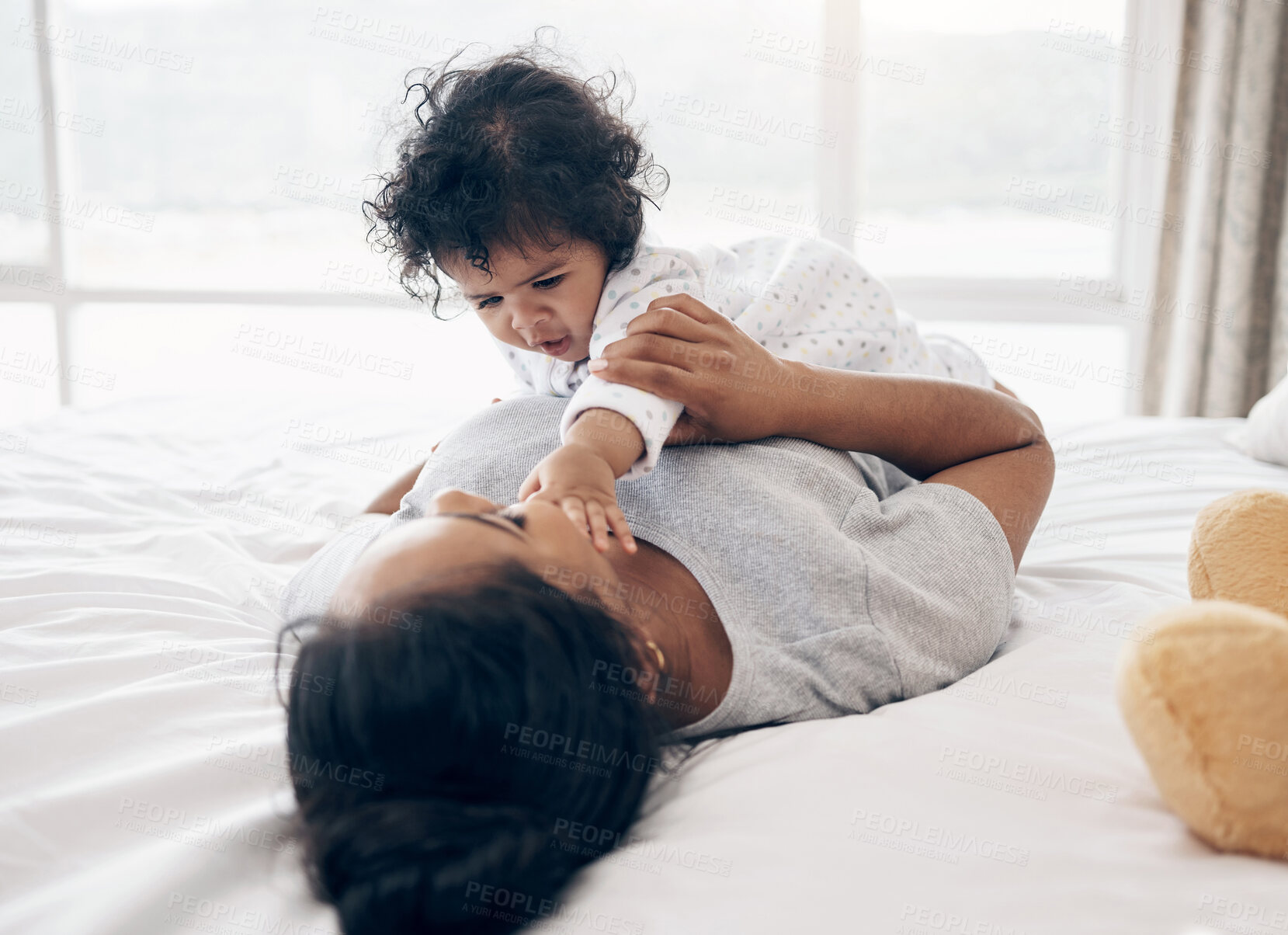 Buy stock photo Mother, care and playing with baby in home, safety and parent responsibility to love child. Mama, daughter and bonding with infant in bedroom, comforting toddler and support kid with development