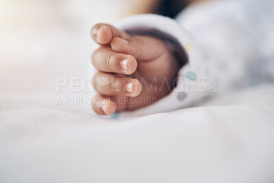 Buy stock photo Shot of an unrecognizable baby's hand during a nap at home