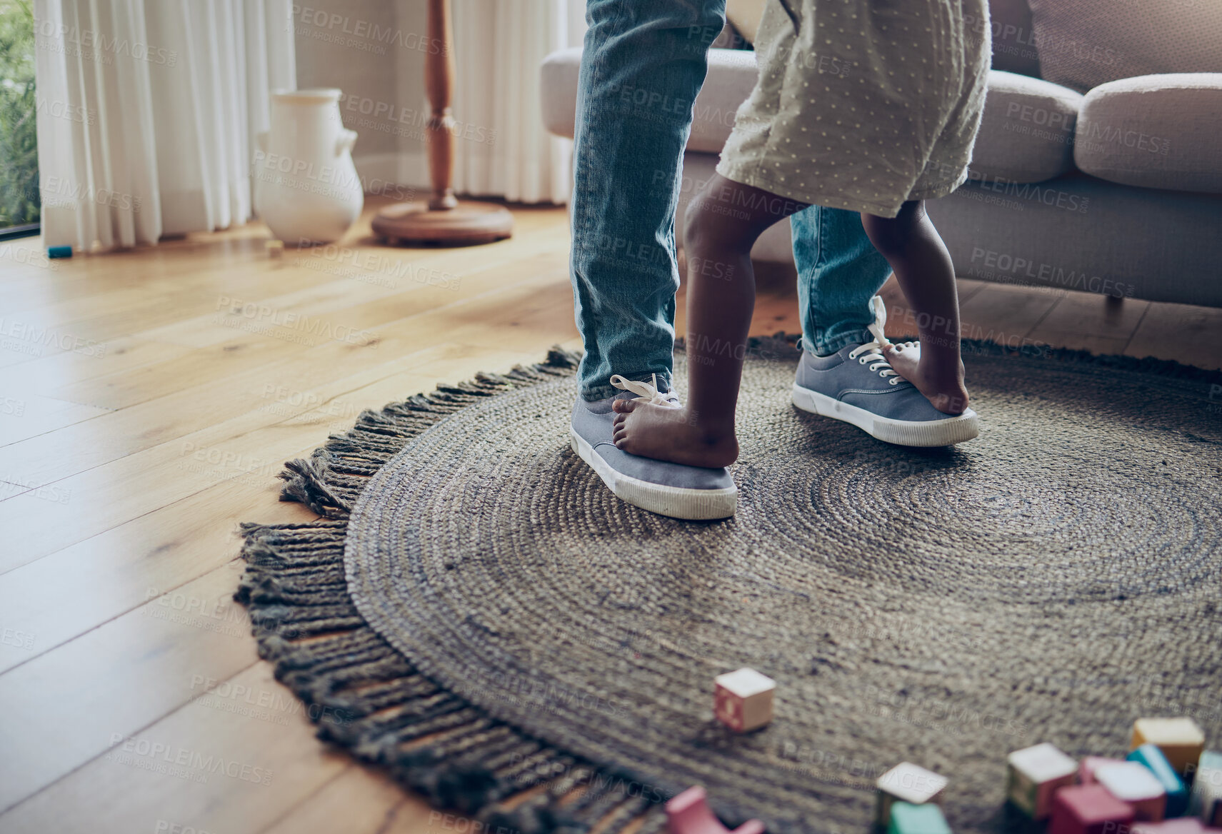 Buy stock photo Parent, kid and dancing on feet in home for teaching movement, bonding together or trust with learning. Family, person or child dancer with balance on shoes for helping, support or childhood memory