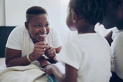Buy stock photo Shot of a young mother and daughter bonding at home