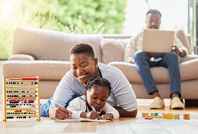 Buy stock photo Shot of a mother and daughter drawing together at home