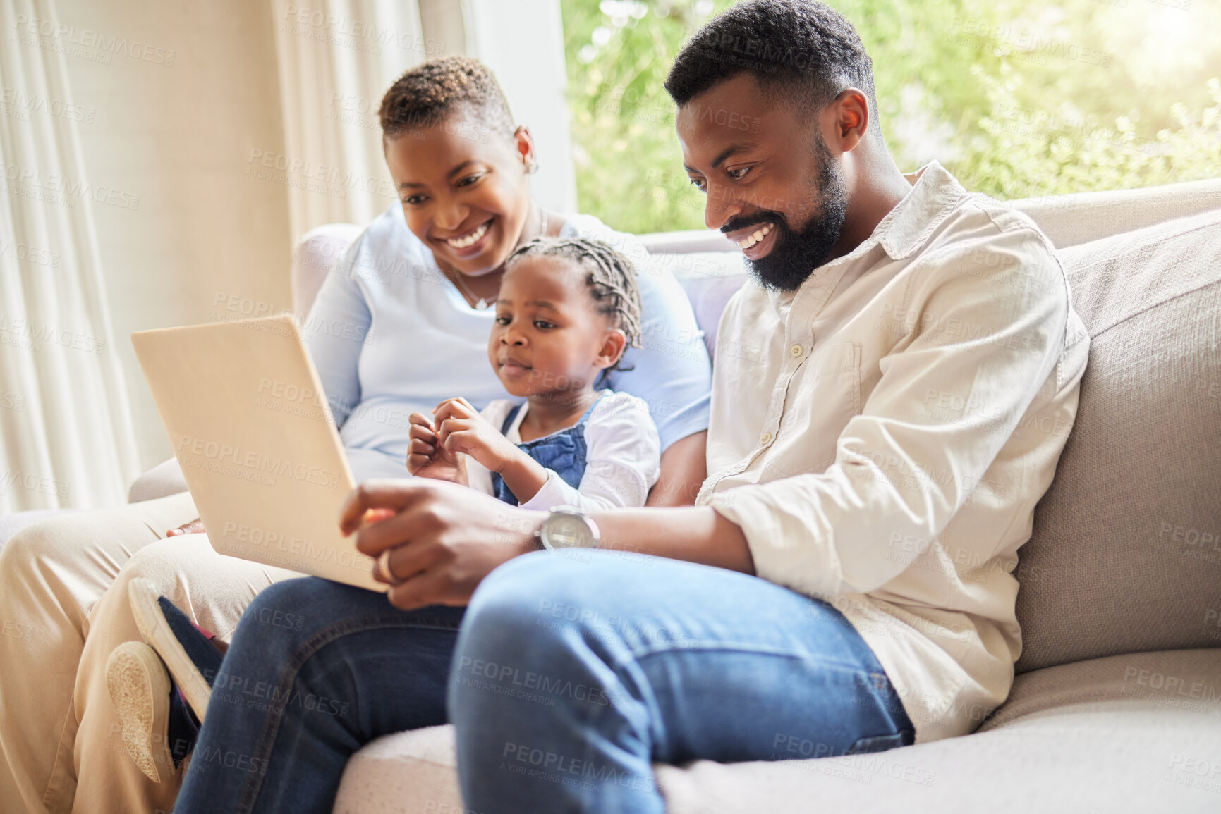 Buy stock photo Laptop, parents and child on couch for streaming, entertainment and educational programs in living room. Happy family, computer and development on sofa with video, internet and support or bonding