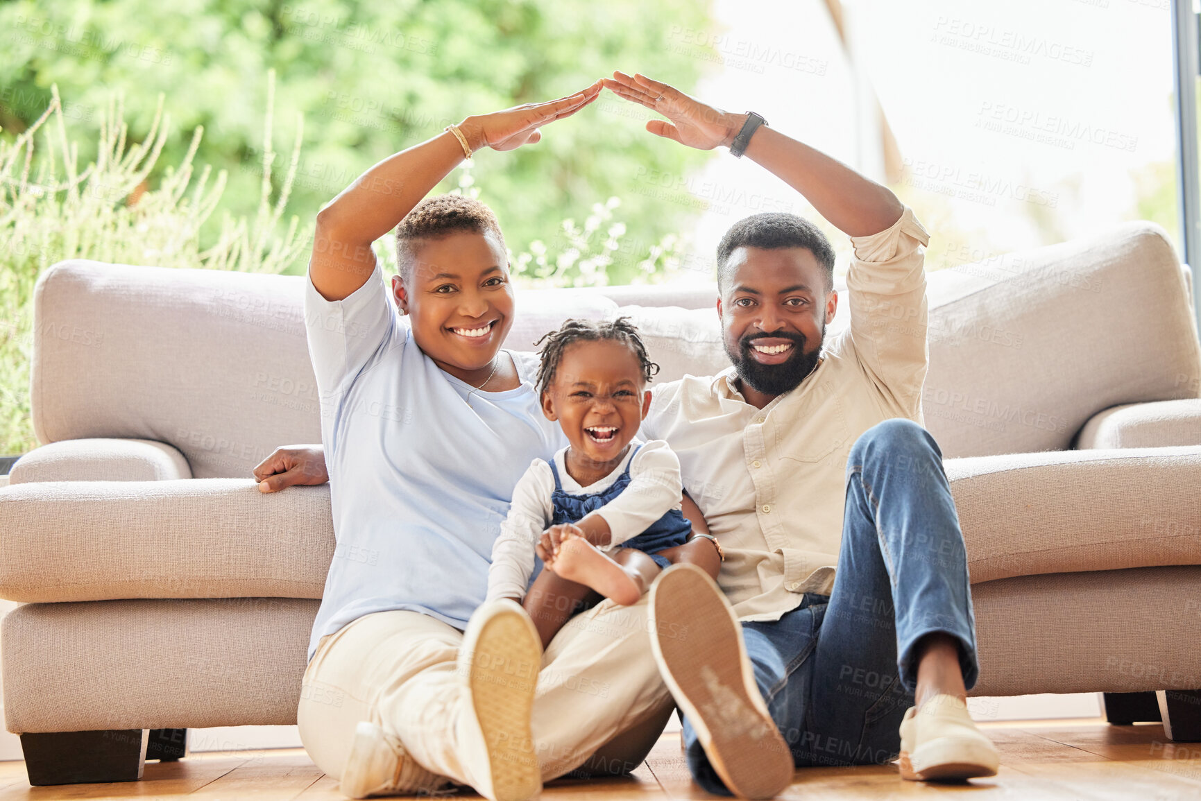 Buy stock photo Family, child and home with roof hands, bonding and love for safety and security for house insurance or protection. Living room, happy portrait and relationship for childhood, together and investment