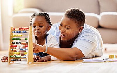 Buy stock photo Learning, help and abacus with mother and daughter in living room for math, education and homeschooling. Numbers, support and study with black woman and girl in family home for teaching and knowledge