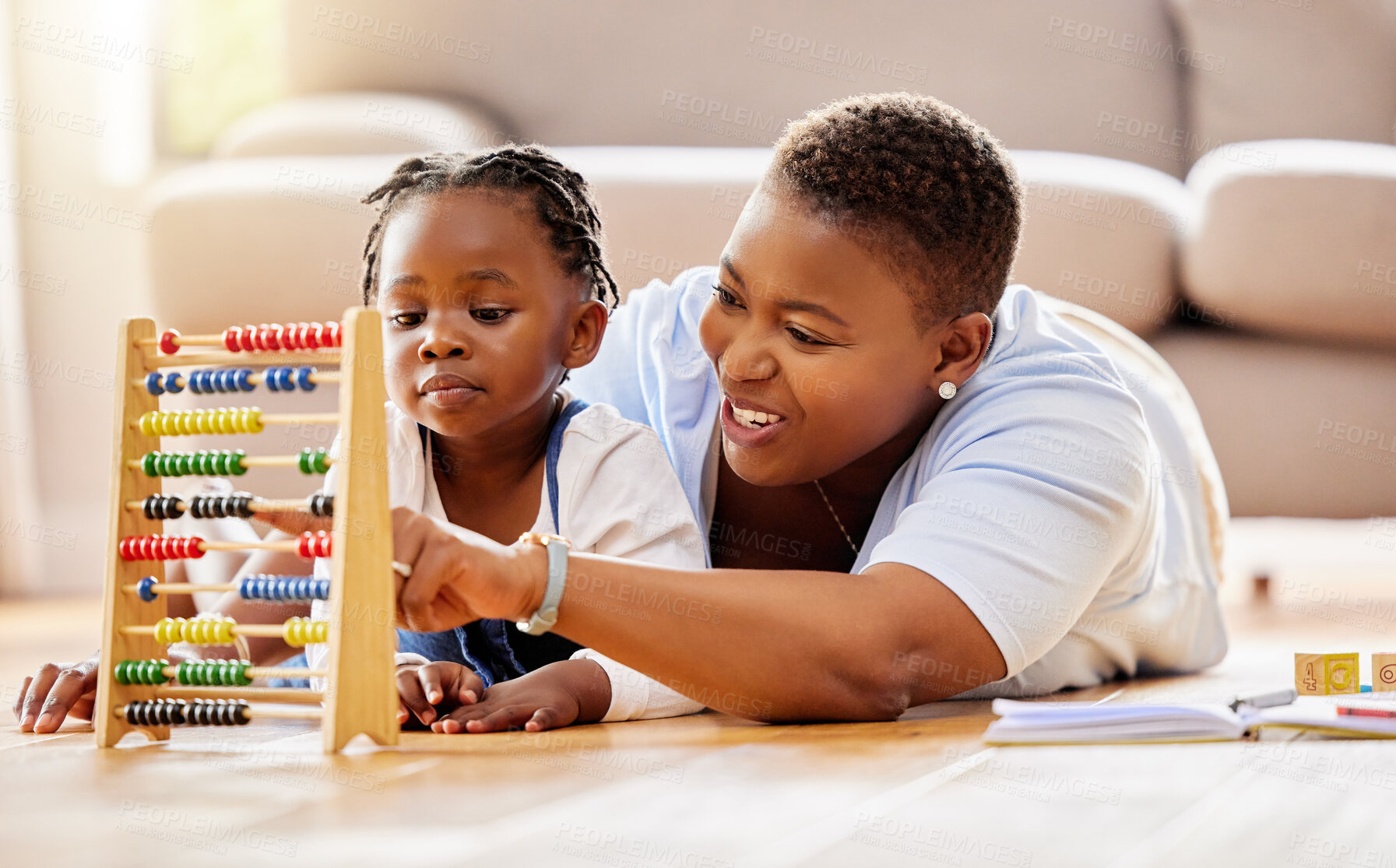 Buy stock photo Learning, help and abacus with mother and daughter in living room for math, education and homeschooling. Numbers, support and study with black woman and girl in family home for teaching and knowledge