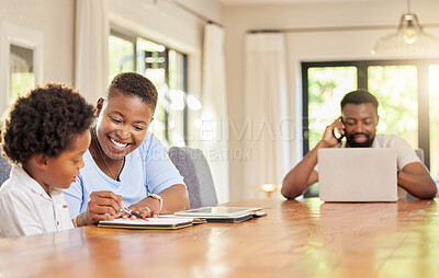Buy stock photo Shot of a mother helping her son with homework at home