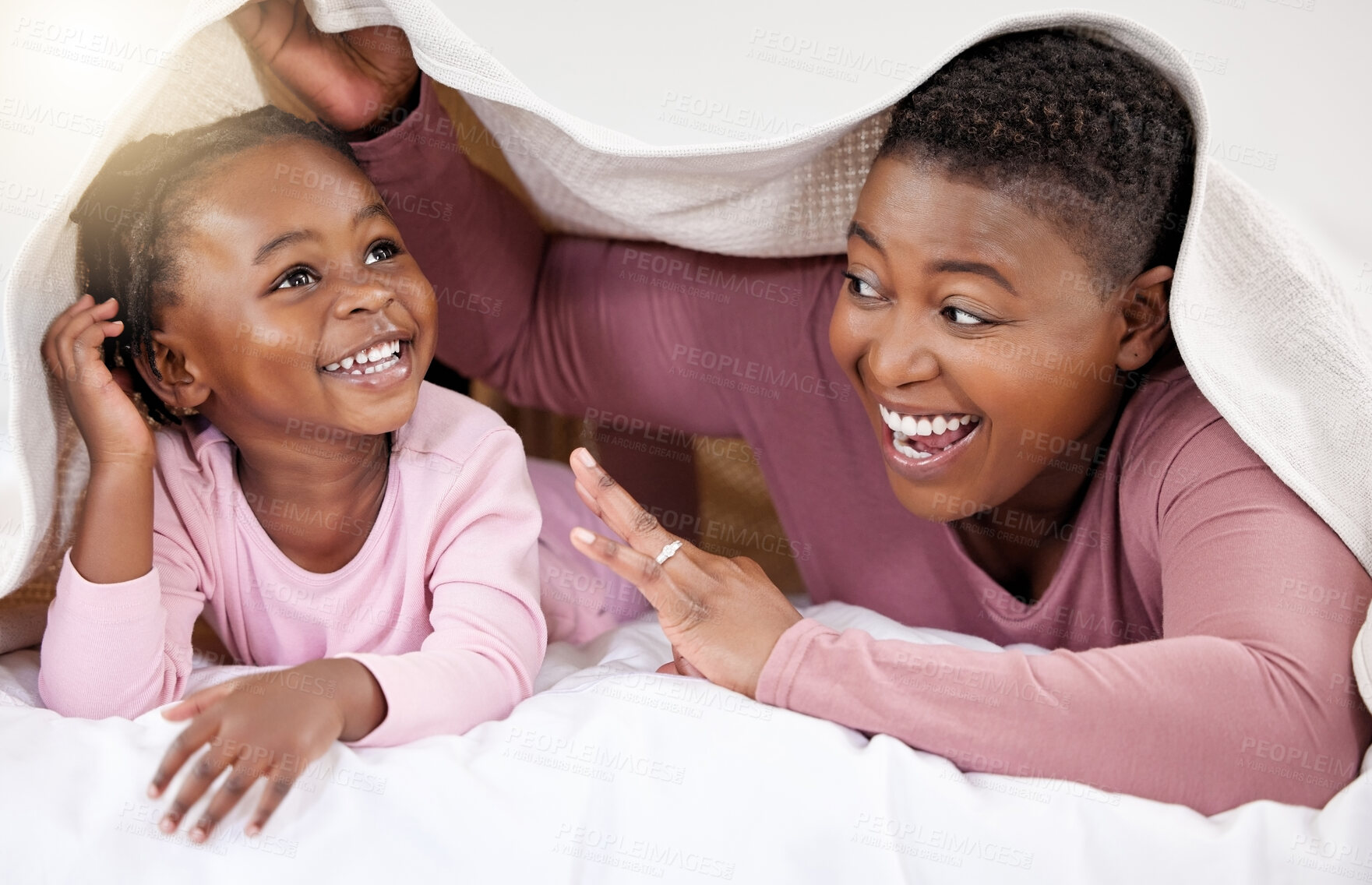 Buy stock photo Black mother, blanket and child with love on bed for relationship trust, morning and bonding for comfort. Young girl, African woman and toddler on mattress with cover for relax together and support