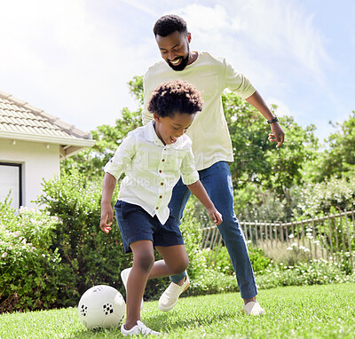 Buy stock photo Soccer game, dad and happy kid on a garden with exercise, sport learning and goal kick together. Lawn, fun father and black family with football on grass with youth, sports development and bonding