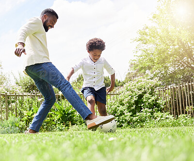 Buy stock photo Soccer, dad and happy kid on a garden with exercise, sport learning and goal kick together. Lawn, fun game and black family with football on grass with youth, sports development and bonding on field