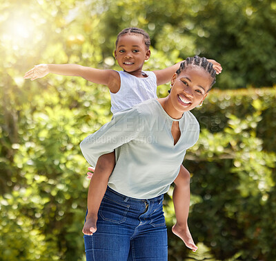 Buy stock photo Black family, portrait and piggy back outdoor with happiness and smile in a park. Mom, young girl and happy kid in nature with mother and child together on a lawn on summer holiday having fun