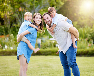 Buy stock photo Shot of a young family spending a day at the park
