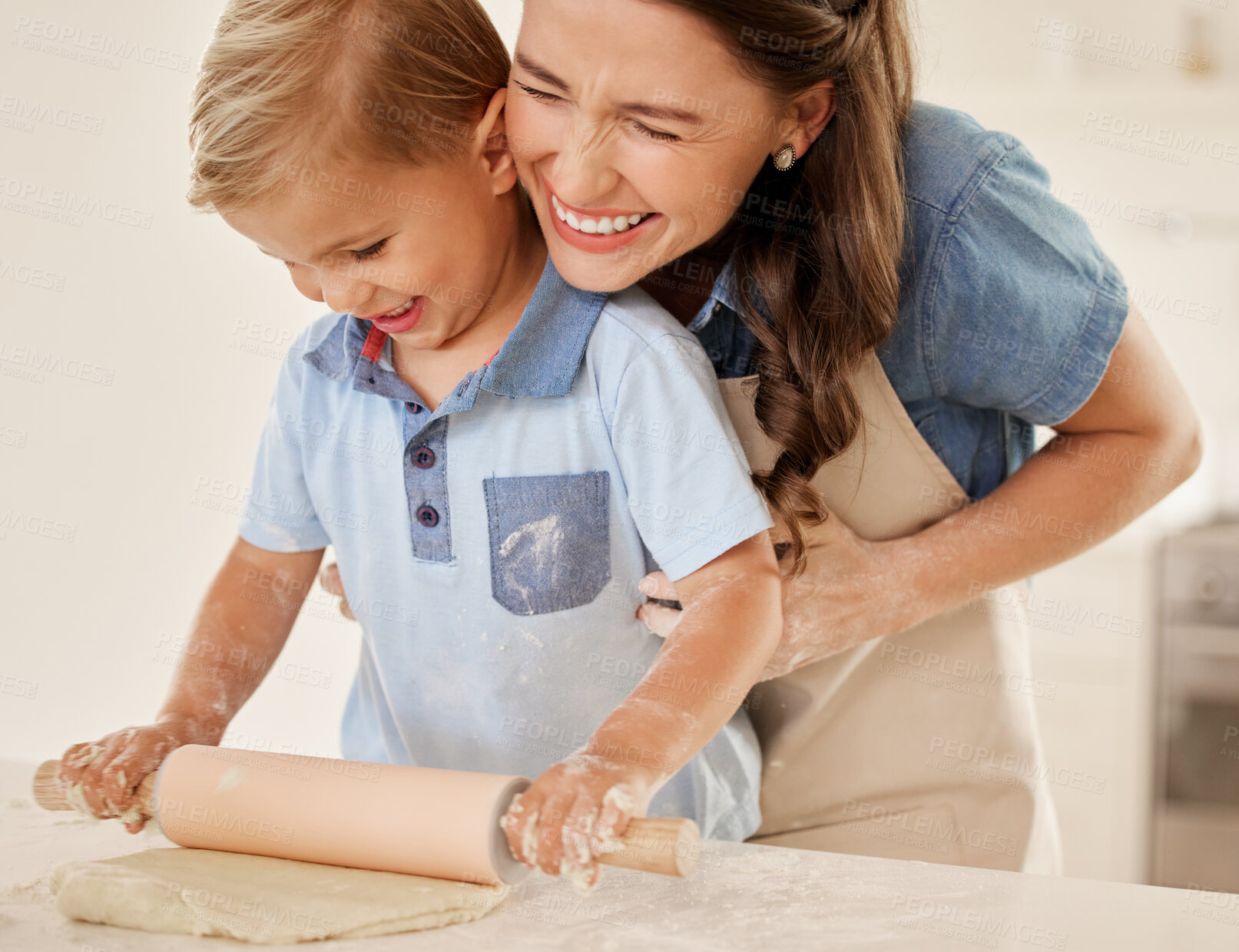 Buy stock photo Mother, son and roll dough in kitchen, flour and pastry or food preparation in home. Happy mommy, boy and support in child development, bonding and learning skill or ingredients for cake baking